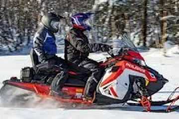 a man riding on the snow