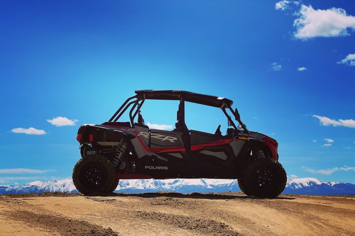 a truck that is sitting in the sand