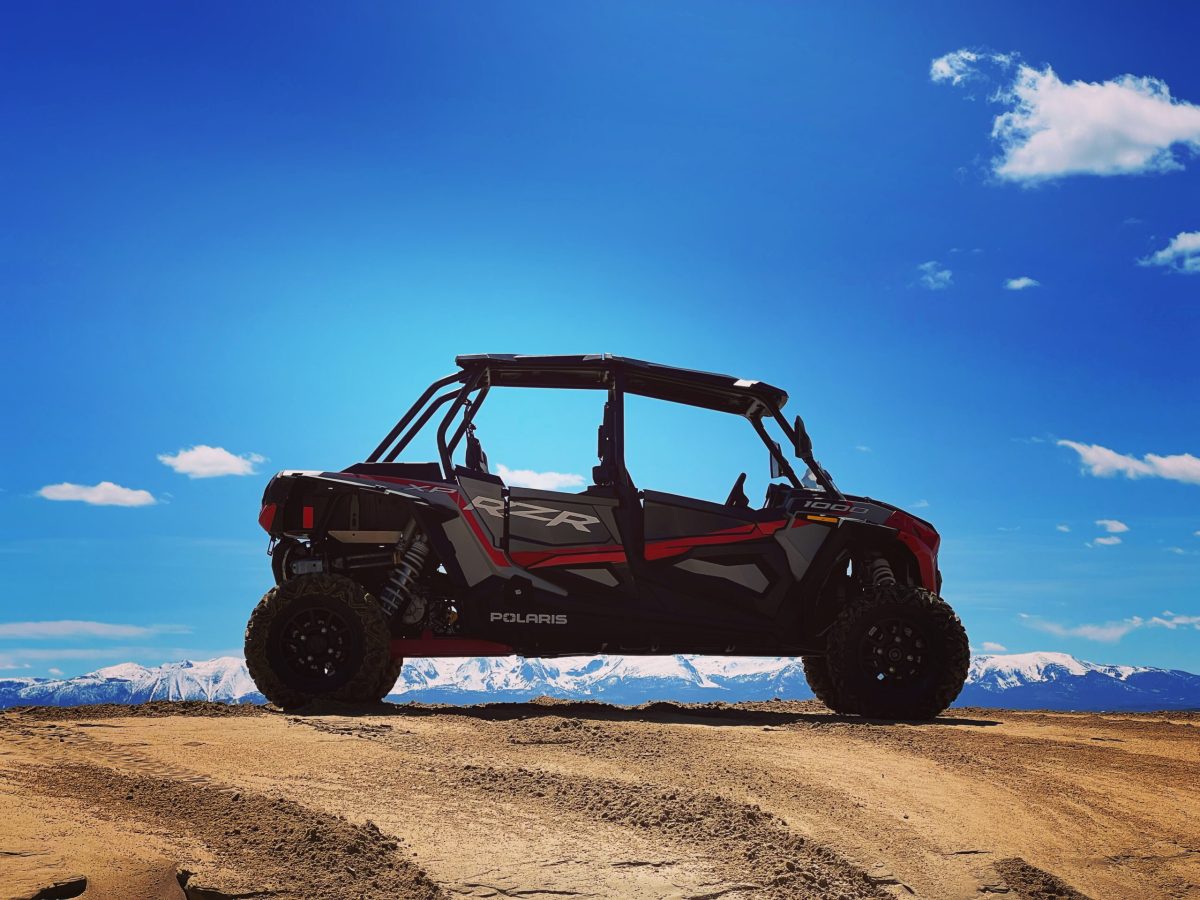 a truck that is sitting in the sand